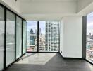 Bright and modern living area with large windows and city view