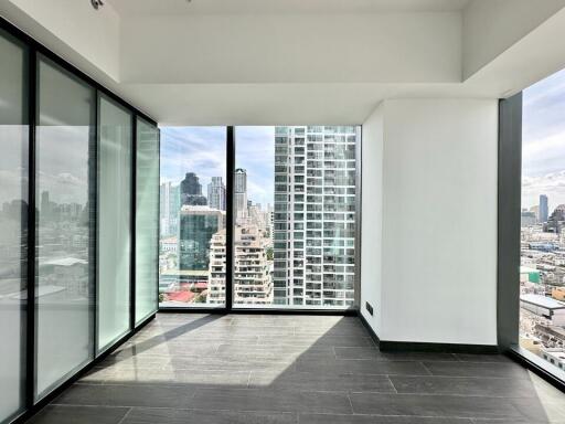 Bright and modern living area with large windows and city view