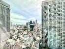 View of cityscape with tall buildings and residential area