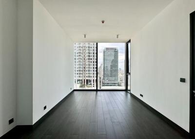 Modern living room with large windows and city view