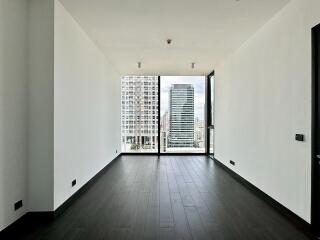 Modern living room with large windows and city view