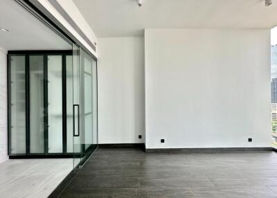 Spacious living area with large glass doors and natural light