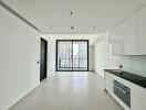 Modern living area with kitchenette and large windows