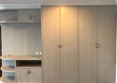 Built-in wardrobe with storage shelves