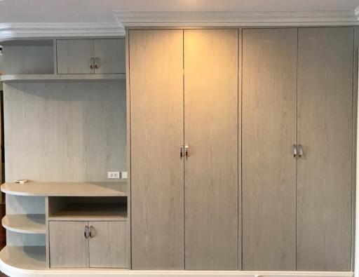 Built-in wardrobe with storage shelves