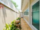 Outdoor passageway with plants and water fountain