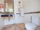 Modern bathroom with tiled flooring and shower area