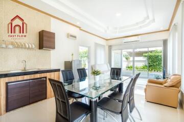 Modern dining room with a glass table