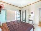 Bright and modern bedroom with direct access to a pool