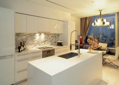 Modern kitchen with island and city view