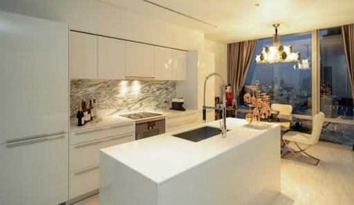 Modern kitchen with island and city view