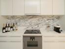 Modern kitchen with marble backsplash