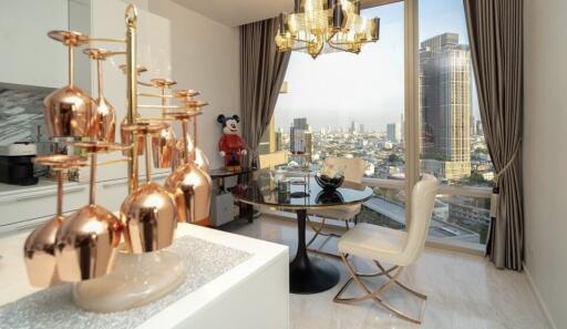 Modern dining area with large windows and city view