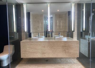 Modern bathroom with double sinks and large mirror