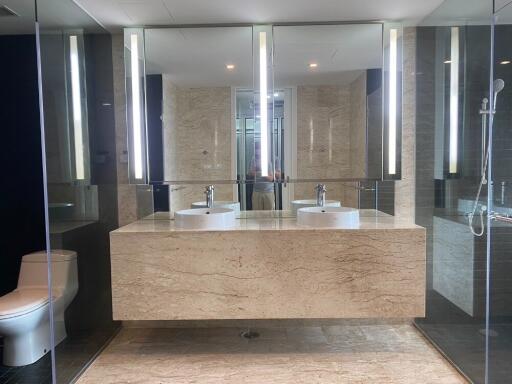 Modern bathroom with double sinks and large mirror