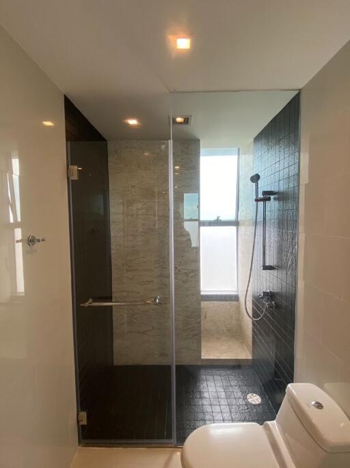 Modern bathroom with glass shower enclosure