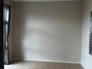 empty room with wooden flooring and recessed lighting