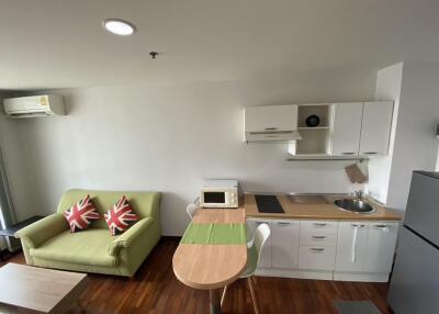 Modern kitchen with adjacent living area