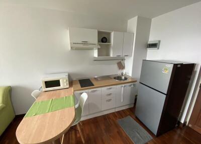 Compact kitchen with dining area