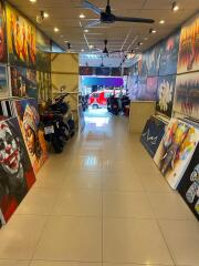 art gallery with various paintings on display