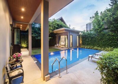Luxurious outdoor area with swimming pool and modern house