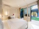 a modern and bright bedroom with large windows and a view of the garden