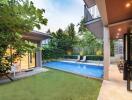 Modern backyard with pool and greenery