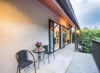 Outdoor patio with seating and view