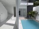 Modern building with pool and staircase