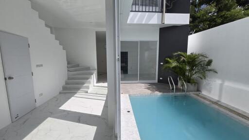 Modern building with pool and staircase