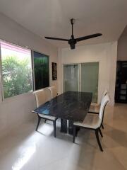 Dining area with table and chairs