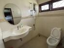 Well-lit bathroom with modern fixtures