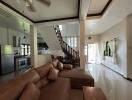 spacious living room with kitchen and dining area