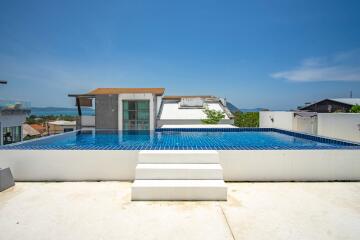 Rooftop swimming pool with steps