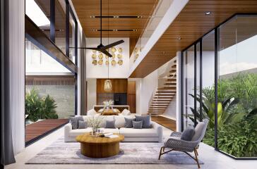 Modern living room with high ceiling and glass walls