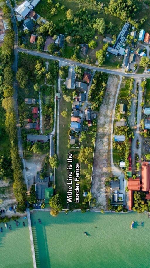 Aerial view of a residential area near a water body