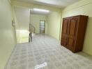 Spacious hallway with a wooden wardrobe