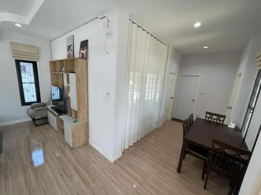 Modern living room with adjoining dining area