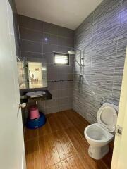 Modern bathroom with shower and toilet