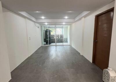 Spacious living room with large glass doors