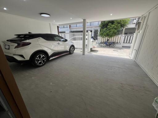 Indoor garage with parked cars