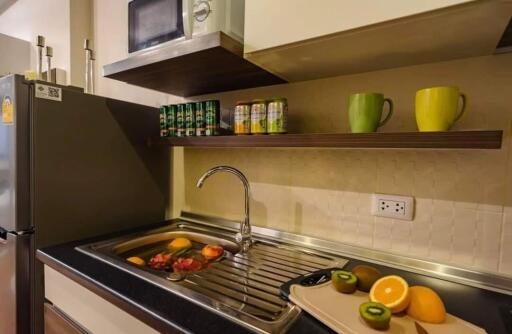 Modern kitchen with fruit and appliances