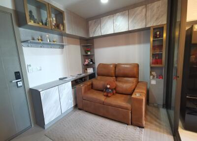 Cozy living room with a brown leather recliner