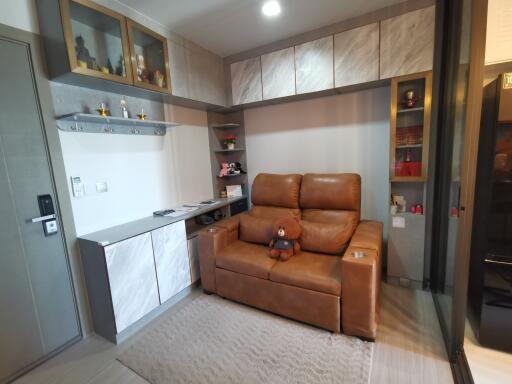 Cozy living room with a brown leather recliner