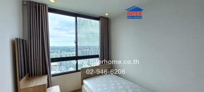 Bedroom with city view