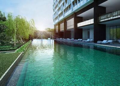 Outdoor luxury swimming pool with adjacent modern residential building