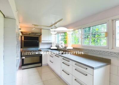 Modern kitchen with ample counter space and natural lighting