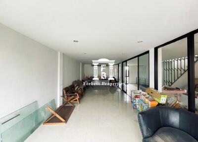 Spacious Hallway with seating and glass partitions