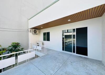 spacious balcony with sliding glass doors