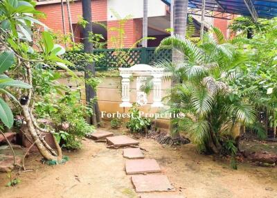 Outdoor view of the building with garden